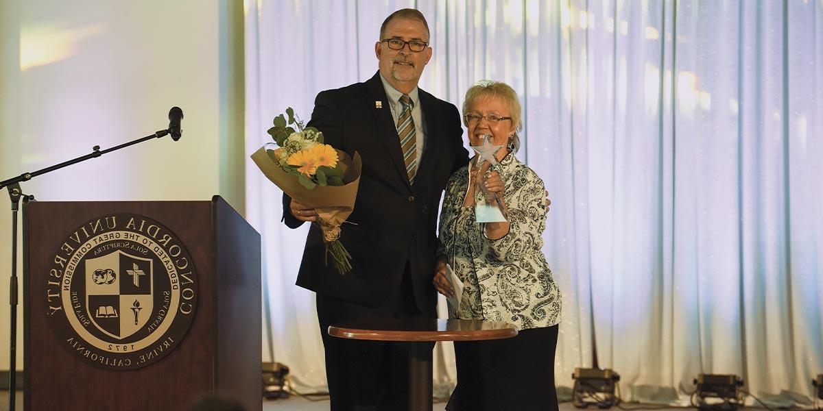 LaVeda accepting her award